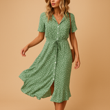 Floral midi dress for women named Lydia, with short sleeves and a flattering fit, perfect for summer parties, casual outings, and terrace days.