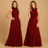 Versatile wrap dress for women named Aurora, with long straps, pleated waist, and 20+ styling options, perfect for weddings, dinners, or special occasions.
