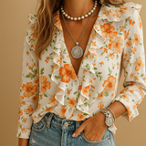 Women’s blouse with ruffles and butterfly print, long sleeves and a comfortable fit, ideal for spring to autumn wear.