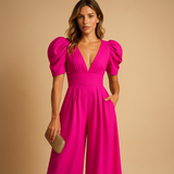 Long elegant jumpsuit for women with tailored waist and flowing design, perfect for formal dinners, galas, or special occasions.