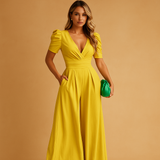 Long elegant jumpsuit for women with tailored waist and flowing design, perfect for formal dinners, galas, or special occasions.