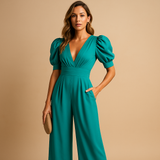 Long elegant jumpsuit for women with tailored waist and flowing design, perfect for formal dinners, galas, or special occasions.
