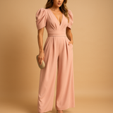 Long elegant jumpsuit for women with tailored waist and flowing design, perfect for formal dinners, galas, or special occasions.