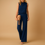 Elegant women’s jumpsuit with round neckline and wide-leg silhouette, perfect for work, evenings, or special occasions.