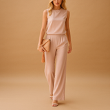 Elegant women’s jumpsuit with round neckline and wide-leg silhouette, perfect for work, evenings, or special occasions.