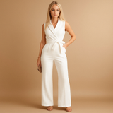 Elegant wrap jumpsuit for women with wide-leg trousers and tailored waist, perfect for formal occasions and stylish business events.