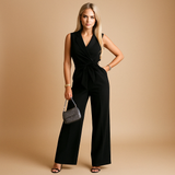 Elegant wrap jumpsuit for women with wide-leg trousers and tailored waist, perfect for formal occasions and stylish business events.