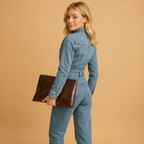 Women’s denim jumpsuit with long sleeves and straight-leg fit in classic blue, ideal for everyday wear in every season.