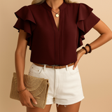 Elegant women’s sleeveless blouse top with a tailored fit in breathable fabric, perfect for work, evenings out, and everyday elegance.