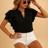Elegant women’s sleeveless blouse top with a tailored fit in breathable fabric, perfect for work, evenings out, and everyday elegance.