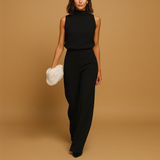 Elegant women’s halter jumpsuit with wide legs, decorative bow, and pockets, ideal for parties, dinners, and warm-weather occasions.