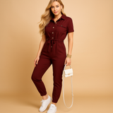 Stylish tailored jumpsuit for women with flattering silhouette and button closure, ideal for work, brunch, or evening occasions.
