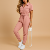 Stylish tailored jumpsuit for women with flattering silhouette and button closure, ideal for work, brunch, or evening occasions.