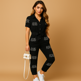 Stylish tailored jumpsuit for women with flattering silhouette and button closure, ideal for work, brunch, or evening occasions.