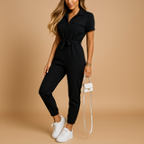 Stylish tailored jumpsuit for women with flattering silhouette and button closure, ideal for work, brunch, or evening occasions.