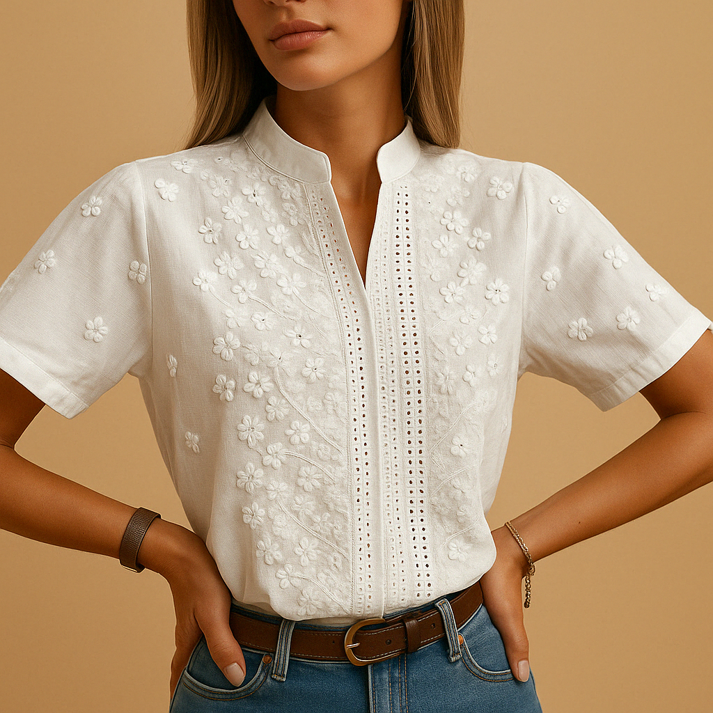 White button blouse for women with a classic collar, lightly tailored fit, and breathable fabric for both work and casual wear.